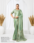 Designer party wear saree design 26809 in Metallic Lustrous Satin Silk featuring Sequins, Beads Hanging, Crystal Detailing with matching stitched blouse.