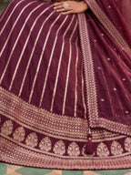 Wine Burgundy Heavy Zari Embroidered Silk Readymade Lehenga Choli - Angle View 2
