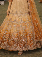 Matching embroidered blouse and flared can-can skirt for Rust Orange Lehenga