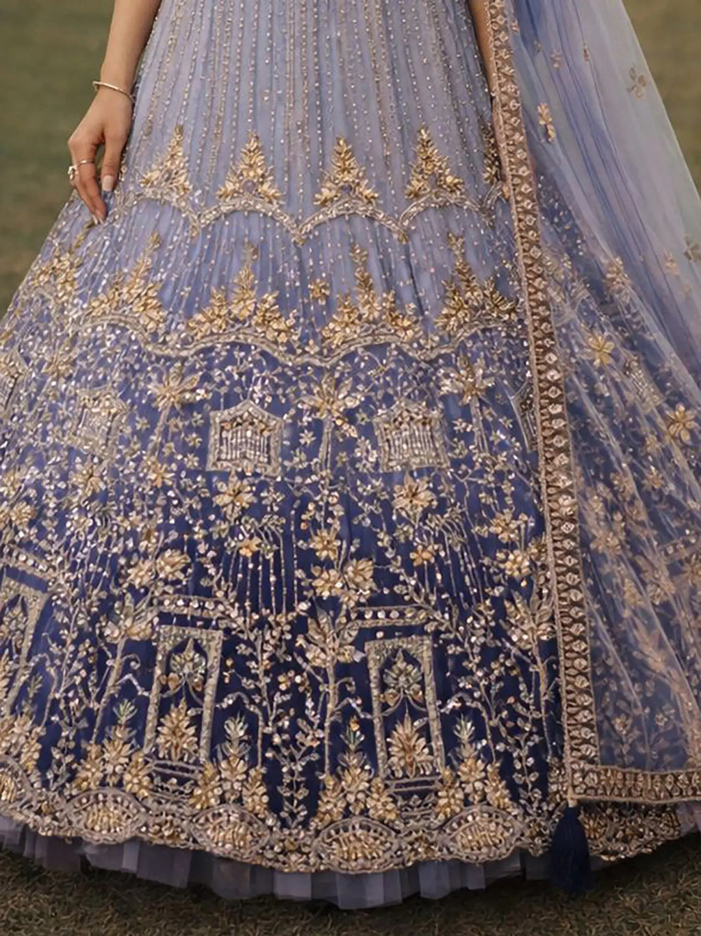 Matching embroidered blouse and flared can-can skirt for Midnight Blue Lehenga
