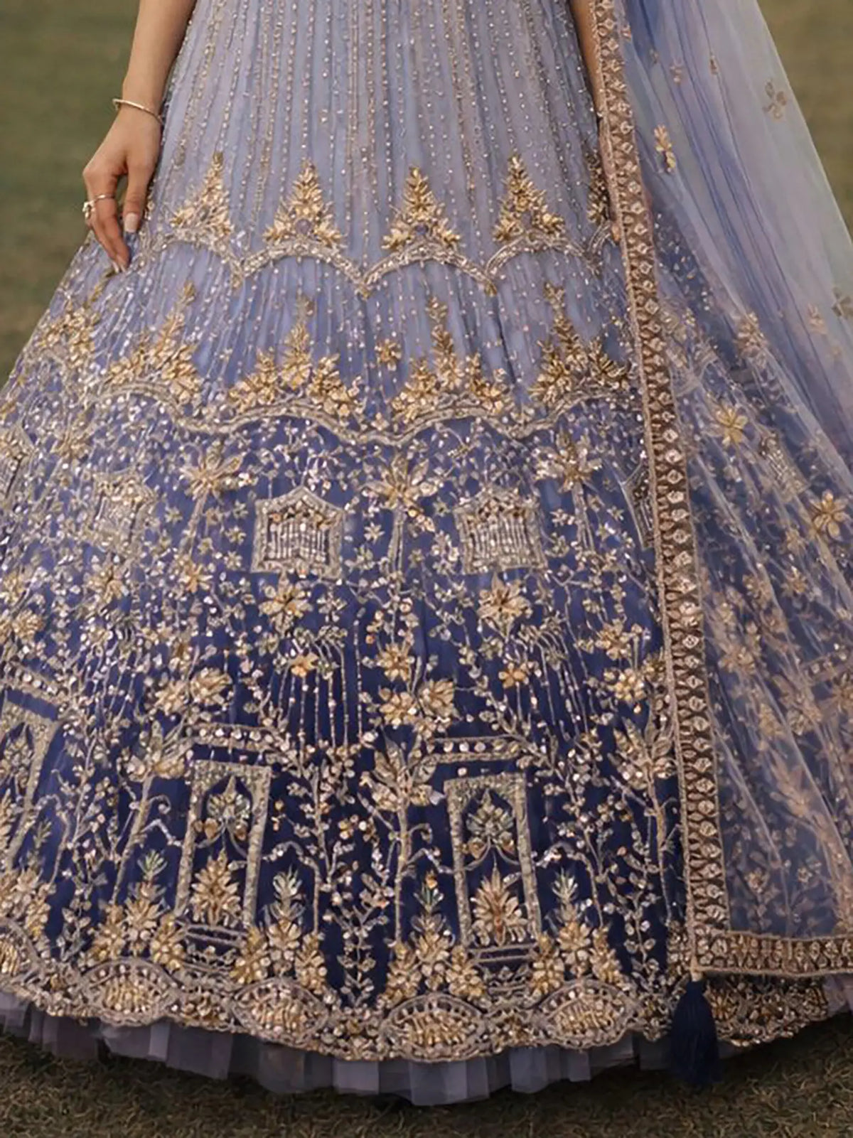 Matching embroidered blouse and flared can-can skirt for Midnight Blue Lehenga