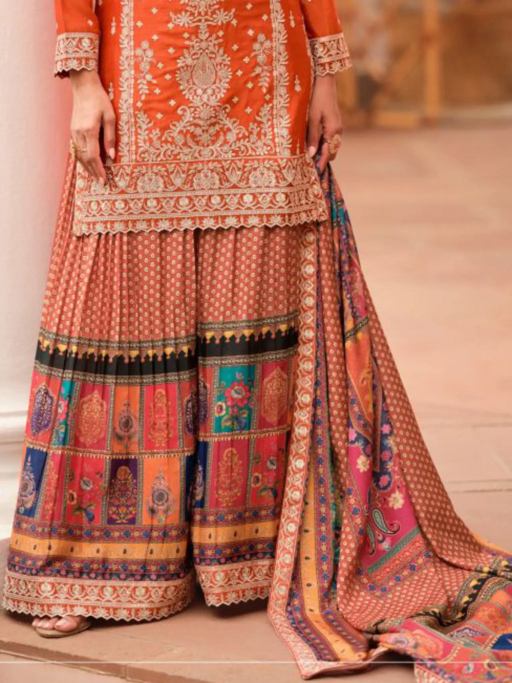 Rust Orange Flared Tiered Printed Palazzo and Coordinated Dupatta Close Up