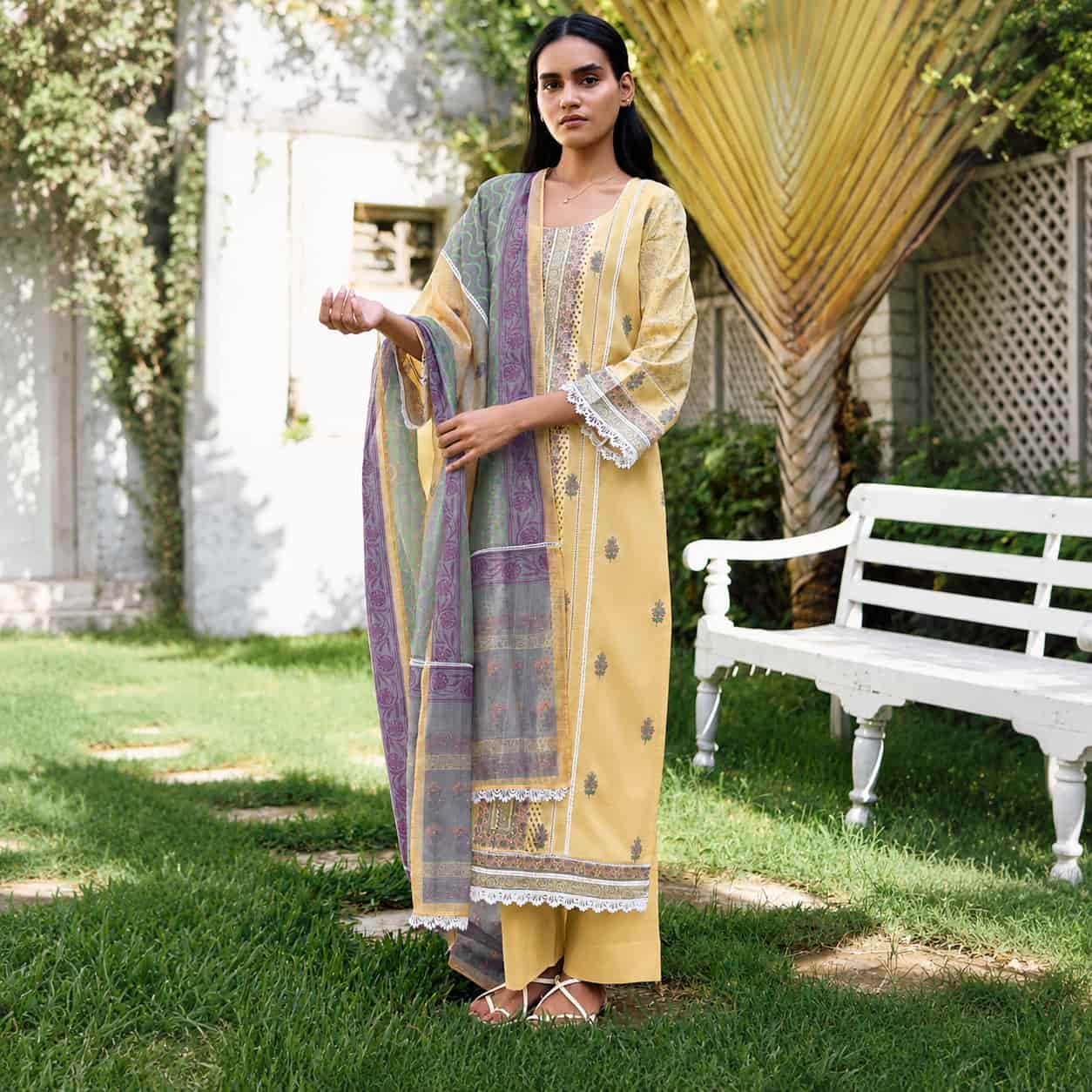 Mustard Yellow Cotton Lawn Digital Print Suit Set featuring mustard yellow color with digital print, resham embroidery and crochet lace detailing