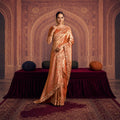 Rose gold Kanjivaram Pure Zari Silk Saree with intricate embroidered border