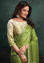 Pistachio Green Organza Silk Saree with Sequins & Thread Embroidery and Ivory Cream Satin Silk Unstitched Blouse