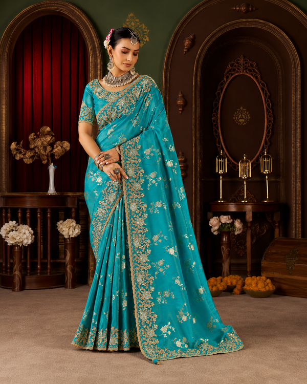 Rama Green Embroidered Border Viscose Silk Party Wear Saree with intricate zari and resham embroidery, scalloped border and designer blouse.