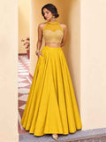 Blush Pink Roman Silk Halter Lehenga Choli Set front drape view - Naksh Creation