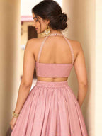 Flared 5.50 meter twirl silhouette and back drape details of Mint Green Roman Silk Lehenga