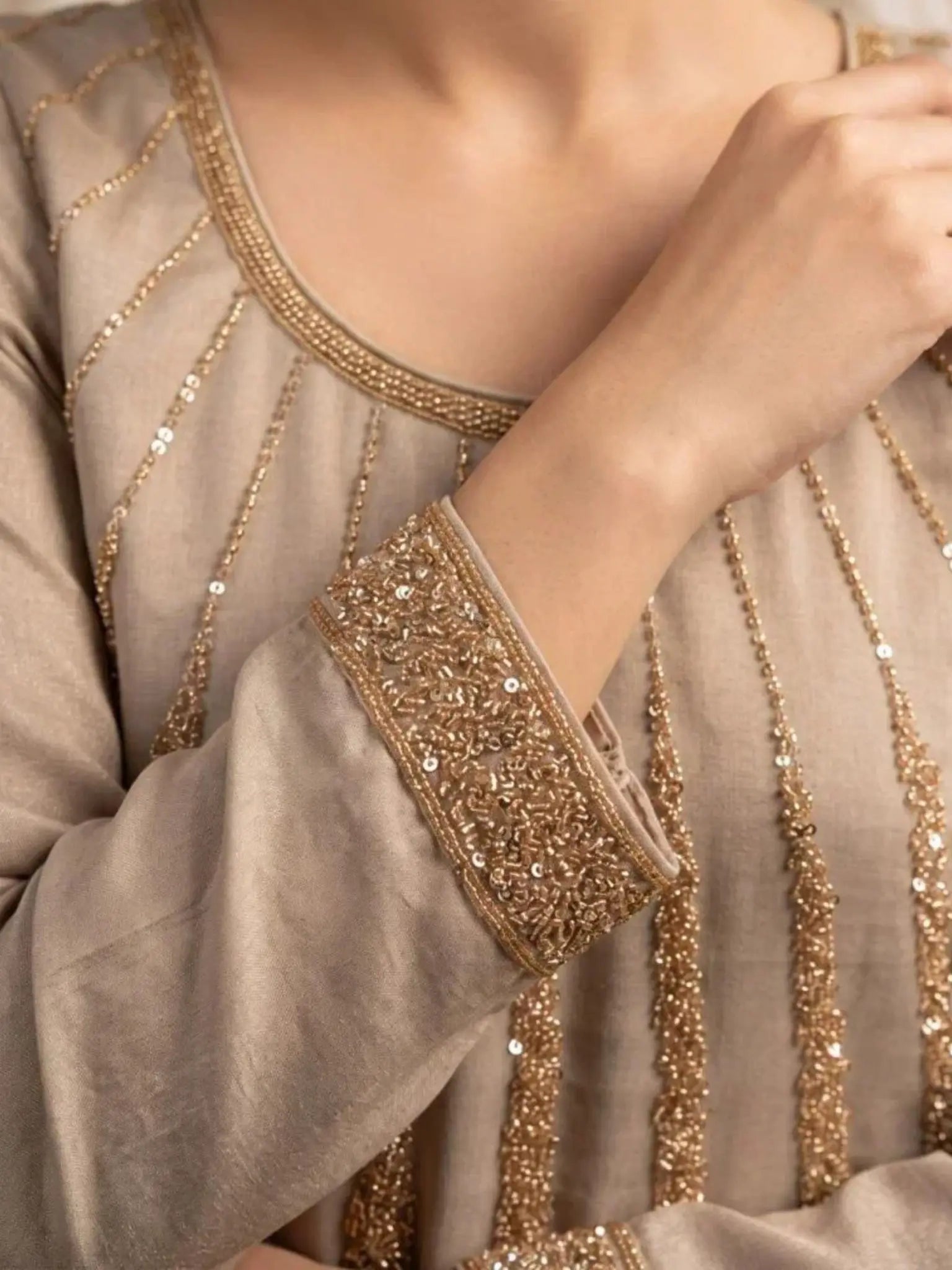 Metallic Taupe Silk Neckline Embellishment and Radiating Panel Beadwork Detail
