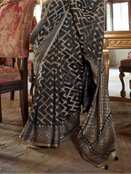 charcoal black georgette printed saree pallu and print detail close-up