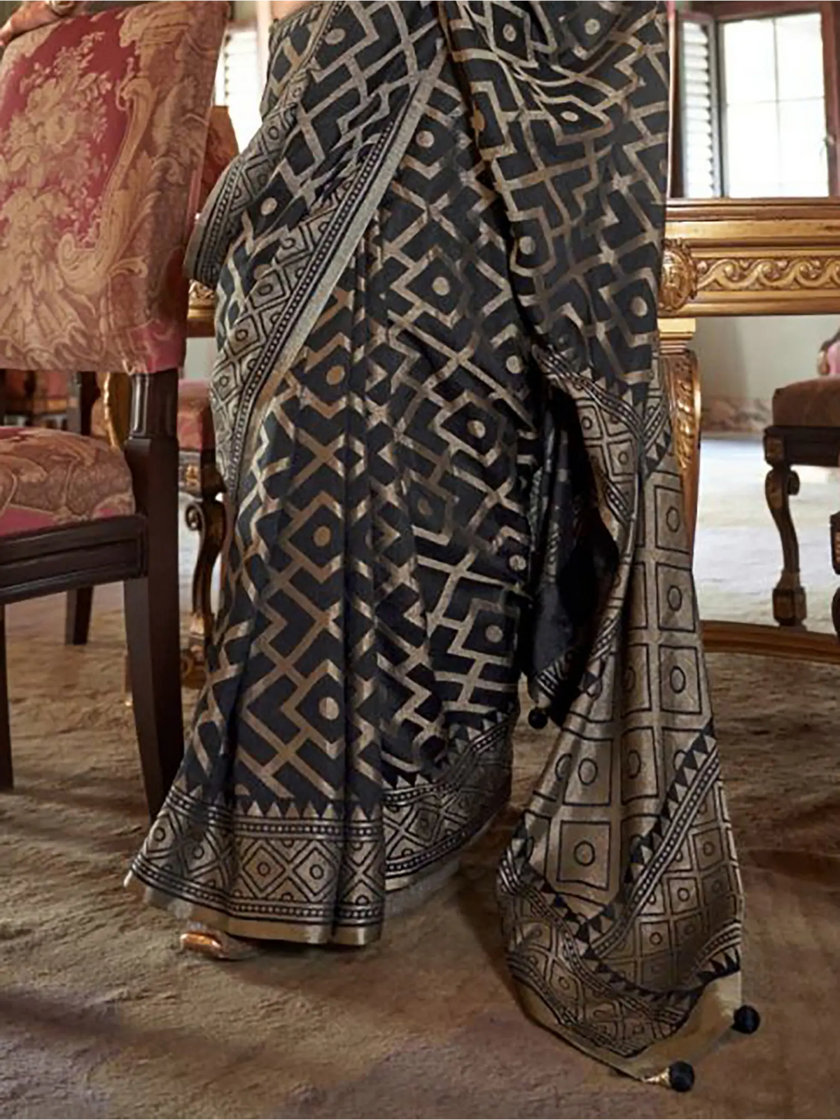 charcoal black georgette printed saree pallu and print detail close-up