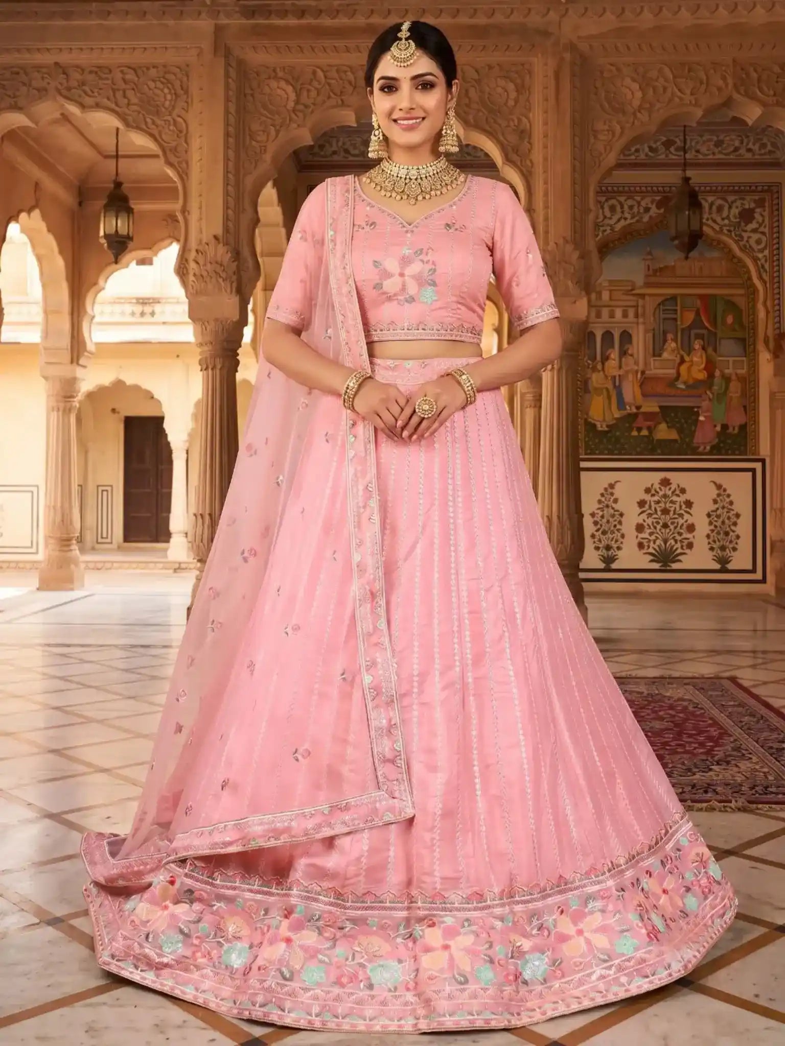 Baby Pink Embroidered Net Semi-Stitched Bridesmaid Lehenga Choli - Front View