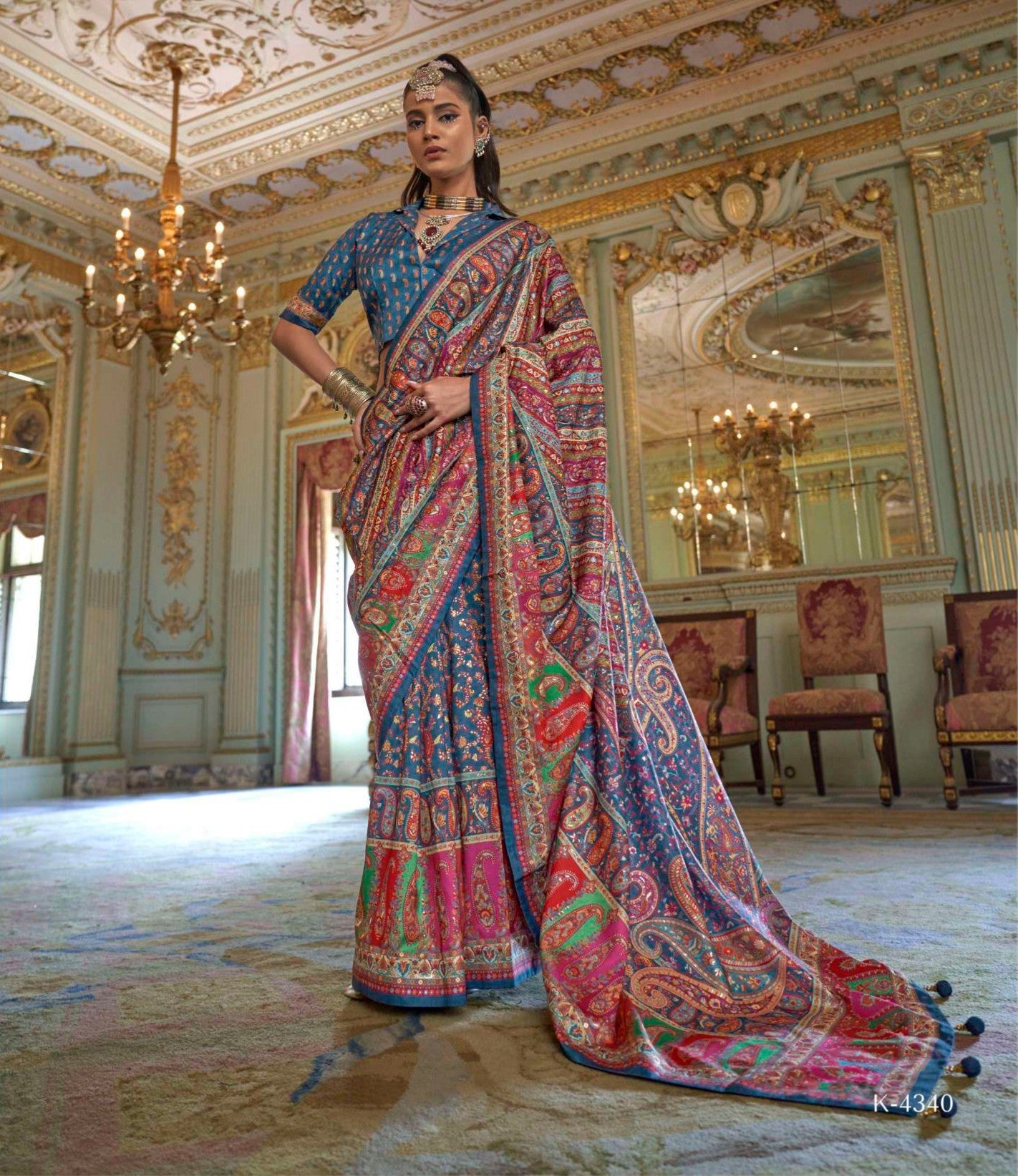 Regal Green Glory Finish Poly Viscose Silk Saree featuring HB luxury print, glory finish and matching Poly Viscose Silk blouse for party wear and festive occasions.