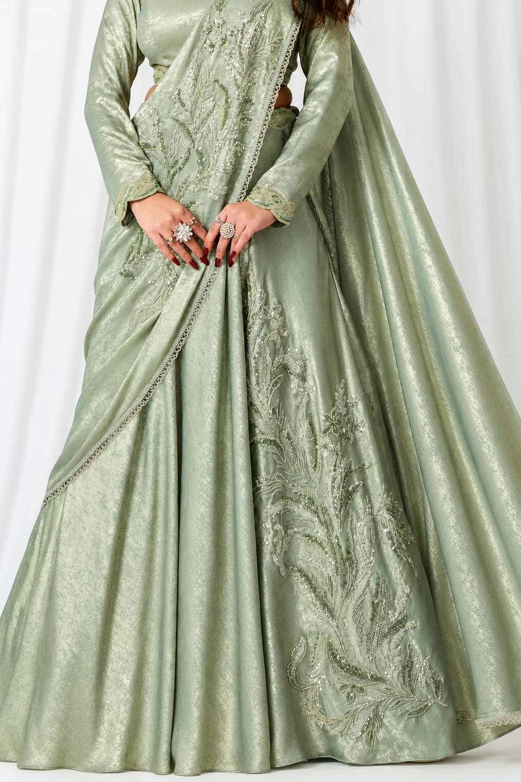Sage Green Metallic Lustrous Satin Silk Leaf Motifs Cutdana Sequin Work Lehenga Saree