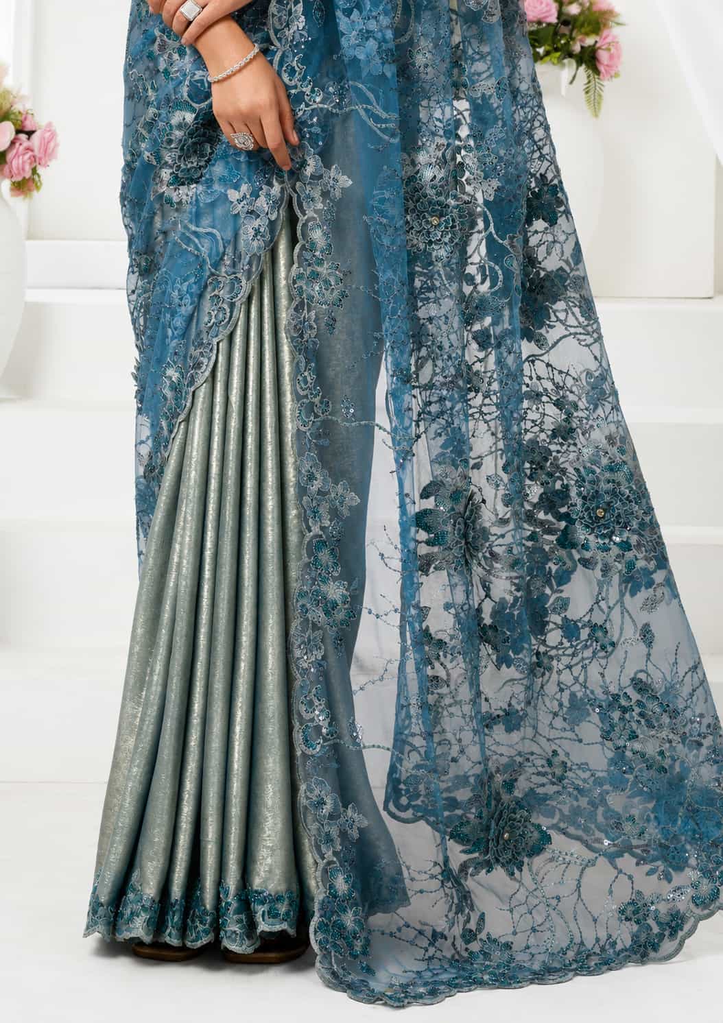 Blue Metallic Lustrous Satin Mono Net Floral Motifs Cutdana Applique Work Saree
